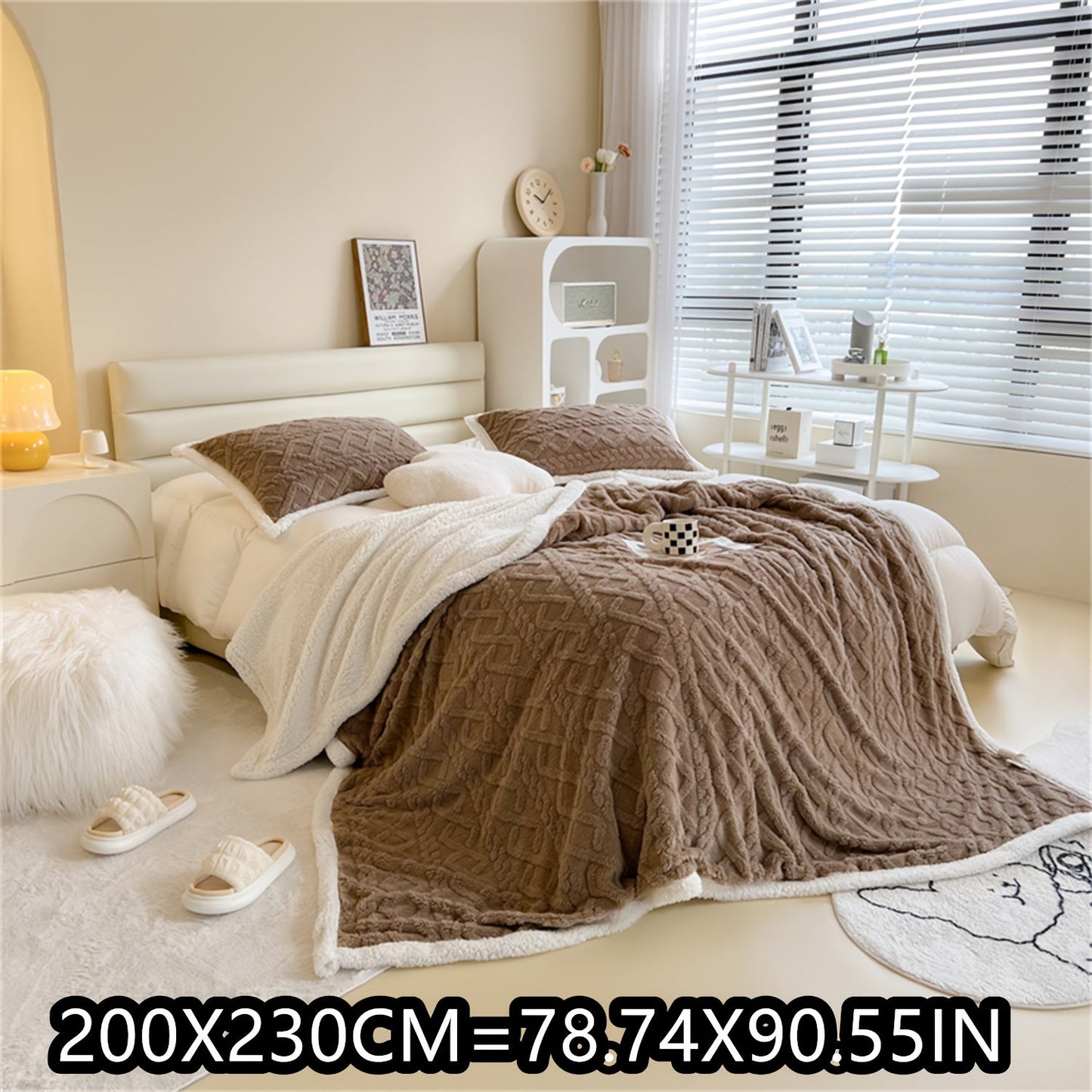 Soft cable-knit fleece blanket in blue, available in 150x200cm or 200x230cm sizes. Featuring a contemporary style, this blanket is machine washable and perfect for use in the bedroom, living room, office, or while camping during the winter. Made with a