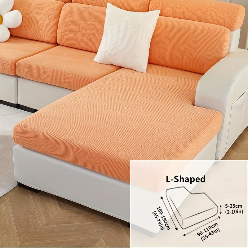 Jacquard sofa slipcover with universal fit and elastic design for furniture protection and home decor in any room.