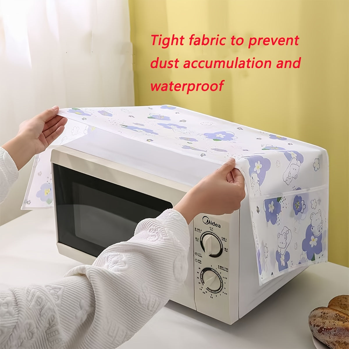 Waterproof and Oil-Resistant PVC Microwave Oven Dust Cover, Designed for Easy Storage and Kitchen Organization.