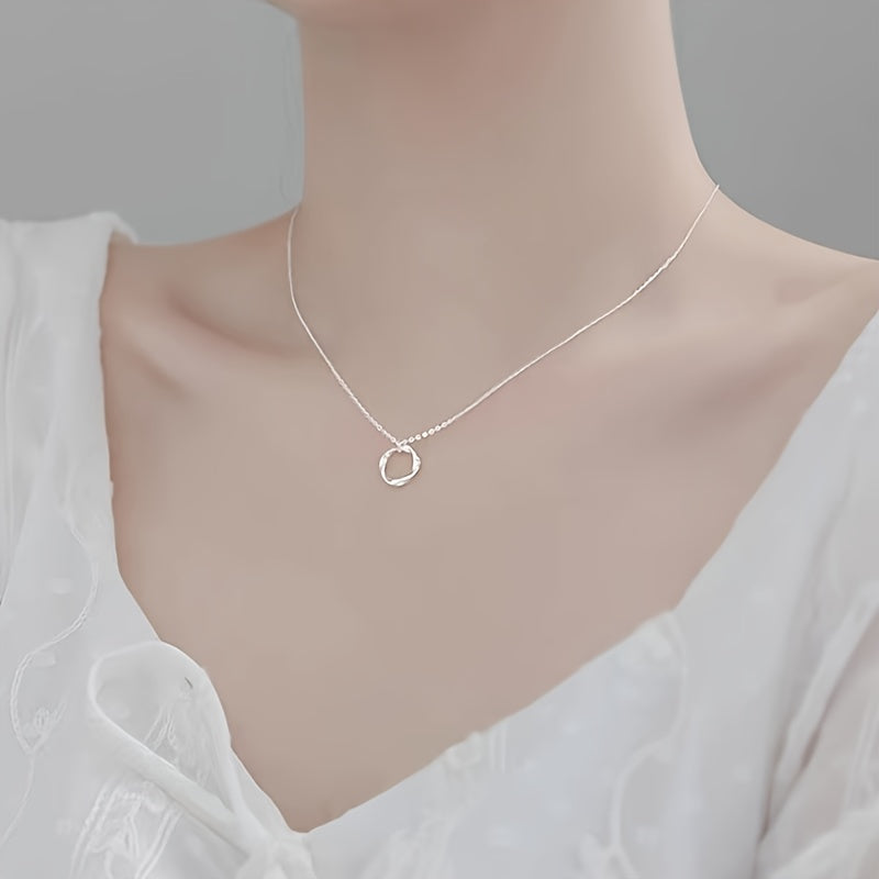 This stylish Sterling Silver Mobius Strip Pendant Necklace is perfect for both daily wear and special occasions. A versatile piece of women's jewelry, this necklace adds a touch of sophistication to any outfit.