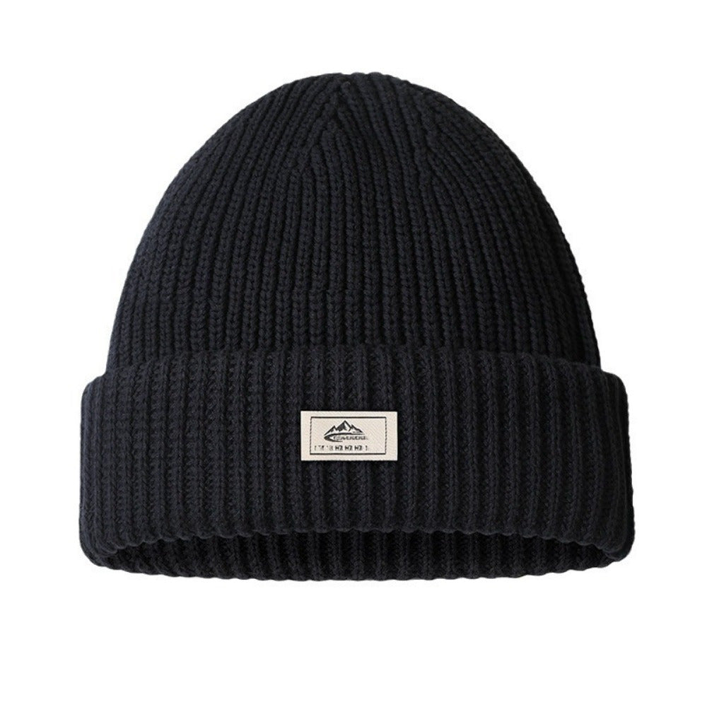 Stay warm and stylish in the winter with this knit beanie that features an integrated face mask. Made with windproof and warm fleece, it is perfect for outdoor activities such as cycling during the autumn season.