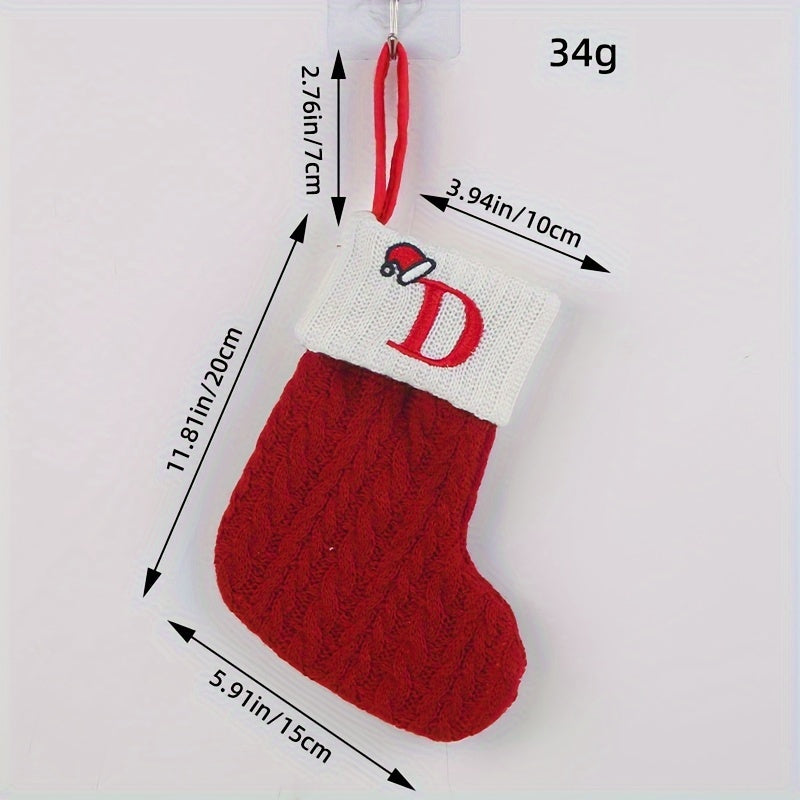 Knitted letter Christmas socks for home tree ornaments; red socks in gift bag for festive attire.