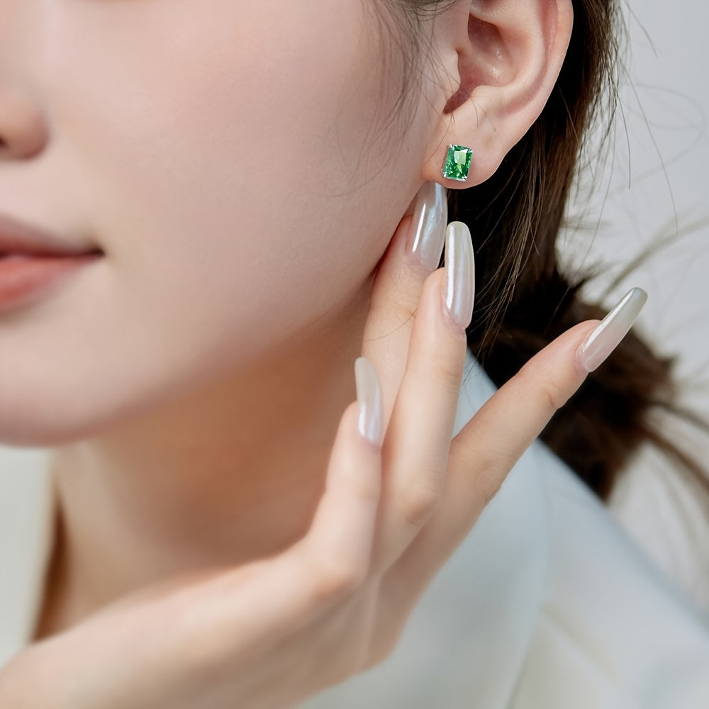 Stylish and elegant Women's Stud Earrings featuring 8 Carat Emerald Green Zirconia with Excellent Quality Sparkle Ice Cut, set in S925 Silver Plated with Platinum and Gold Mosaic. A popular and fashionable choice for women.