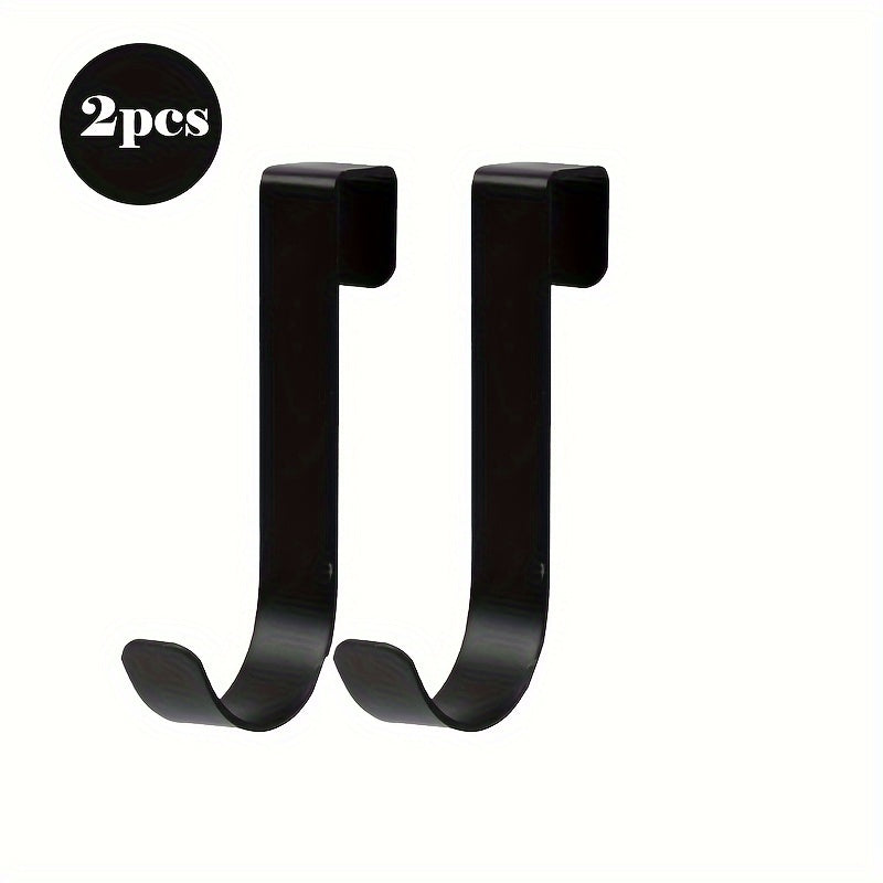 2 sleek black & white J-shaped hooks for easy installation, ideal for hanging towels, bags, and decorations in bathroom, kitchen, and cabinets.