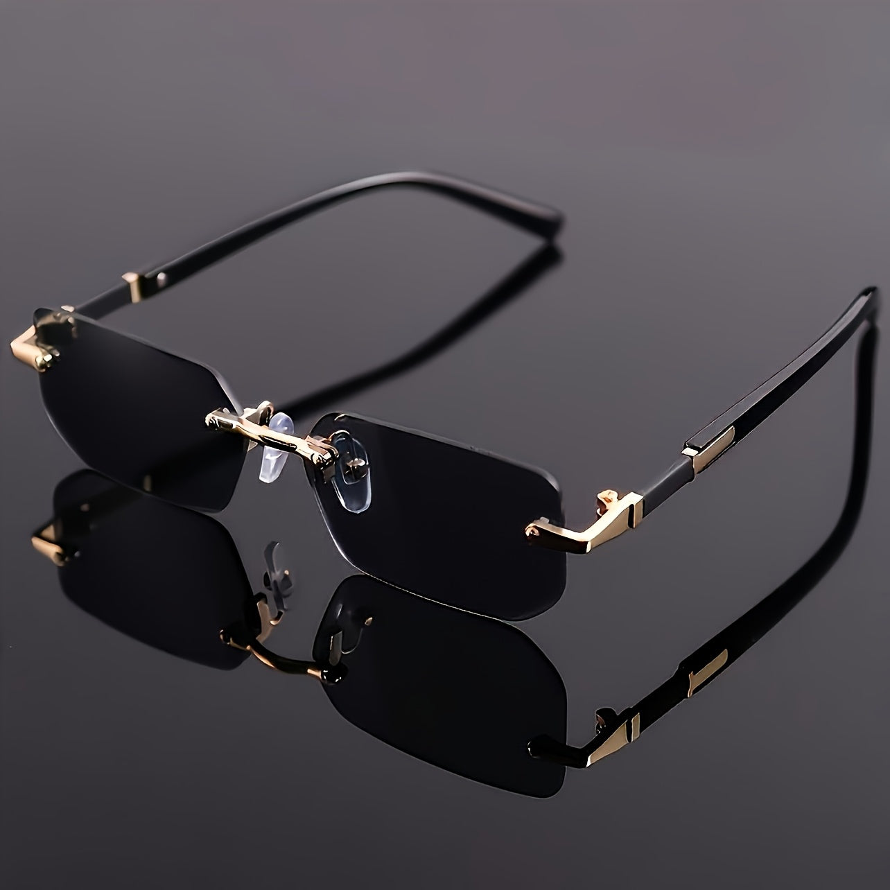 One pair of men's square rimless glasses in black with mirrored PC lens and metal frame for casual hip hop fashion.