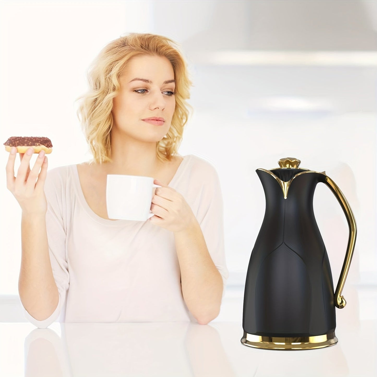 Beautiful insulated coffee carafe with a sleek double-walled design featuring a charming golden tree motif. This white ceramic thermal flask is vacuum sealed to keep beverages hot or cold. Perfect for tea and coffee lovers, this carafe is a must-have