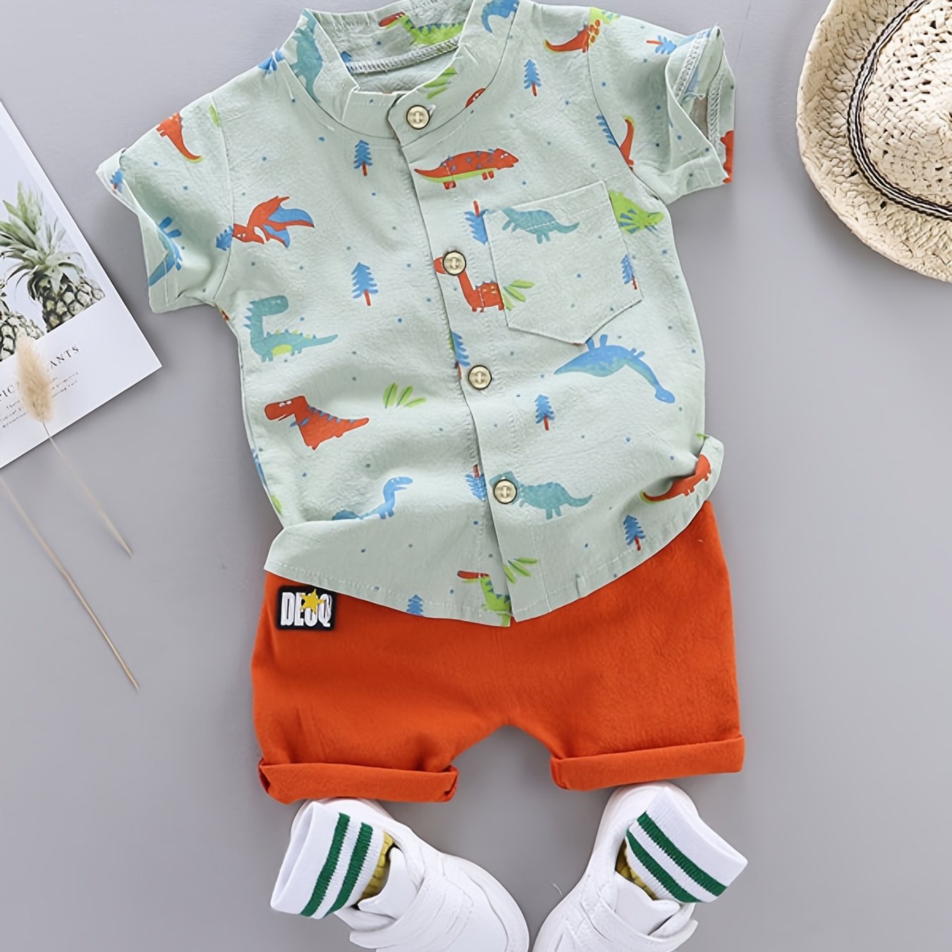 Set of 2 toddler boys' outfits featuring dinosaur print button shirt and elastic waist shorts for daily and outdoor wear.