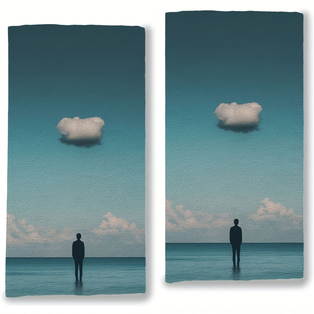 Two pieces of ultra soft kitchen towels featuring the "Solitary Cloud" sky design. These towels are highly absorbent and machine washable, making them perfect for drying dishes and hands. Add a touch of contemporary coastal decor to your kitchen with