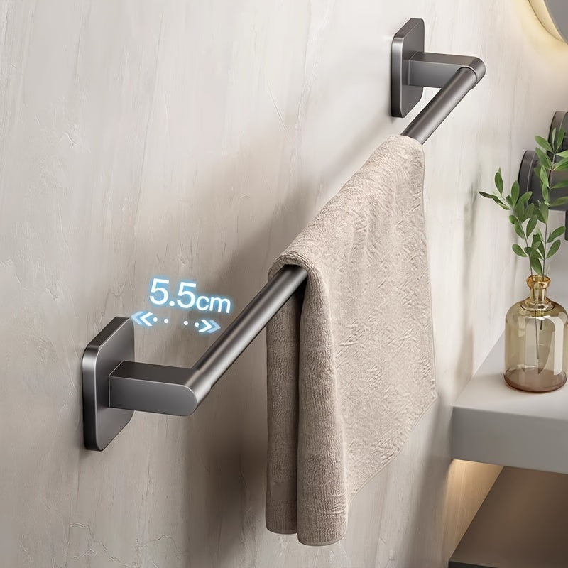 Wall-mounted towel rack for bathroom made of durable space aluminum and plastic. Easy installation with no drilling required. Single rod design for organizing towels.