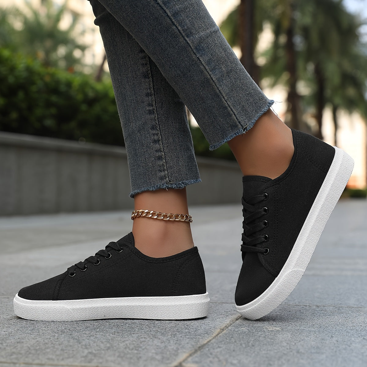 Women's platform skate sneakers with breathable fabric upper and durable PVC sole. Versatile casual shoes for walking and outdoor activities in black and white. Features comfort insole.