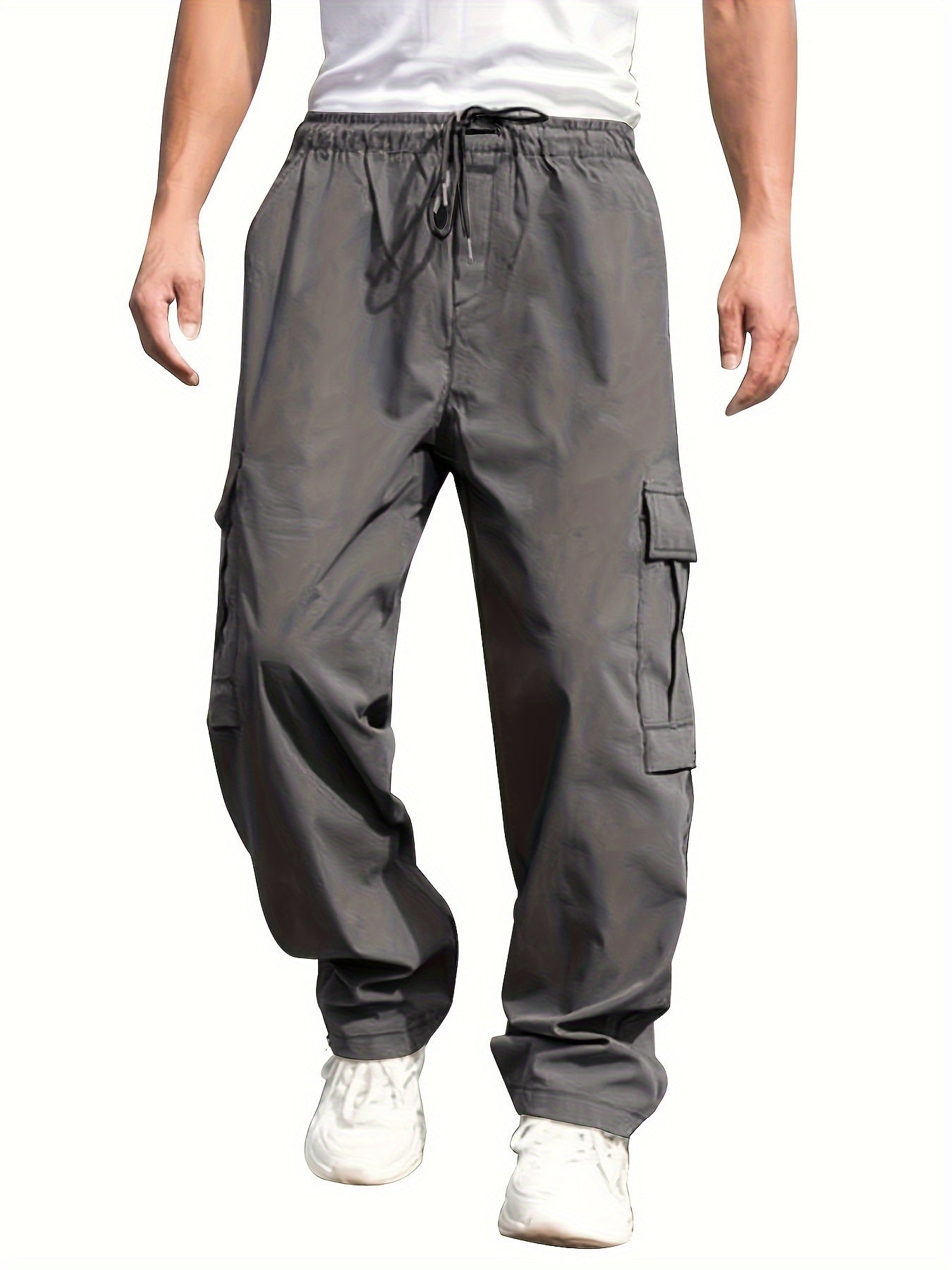 Men's cargo pants for outdoor activities with multiple pockets and drawstring waist.