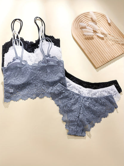 Sexy lingerie set includes cami bra and panties with solid floral lace for women.