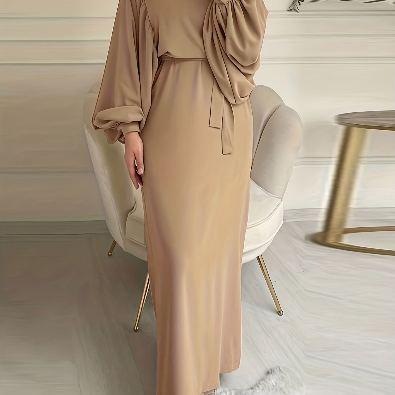 Elegant maxi abaya dress with solid tie waist and lantern sleeves.