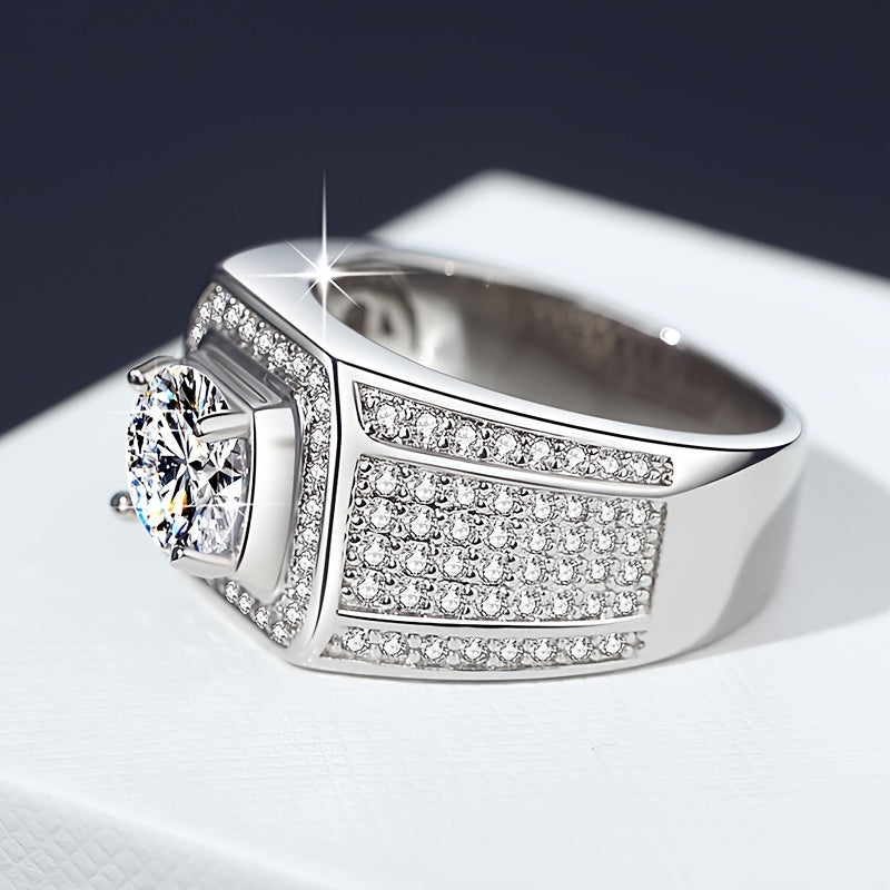 A stunning men's ring crafted with care and precision, featuring a sparkling zirconia set in luxurious 925 sterling silver. This statement piece weighs around 12.3 grams, exuding elegance and dominance.