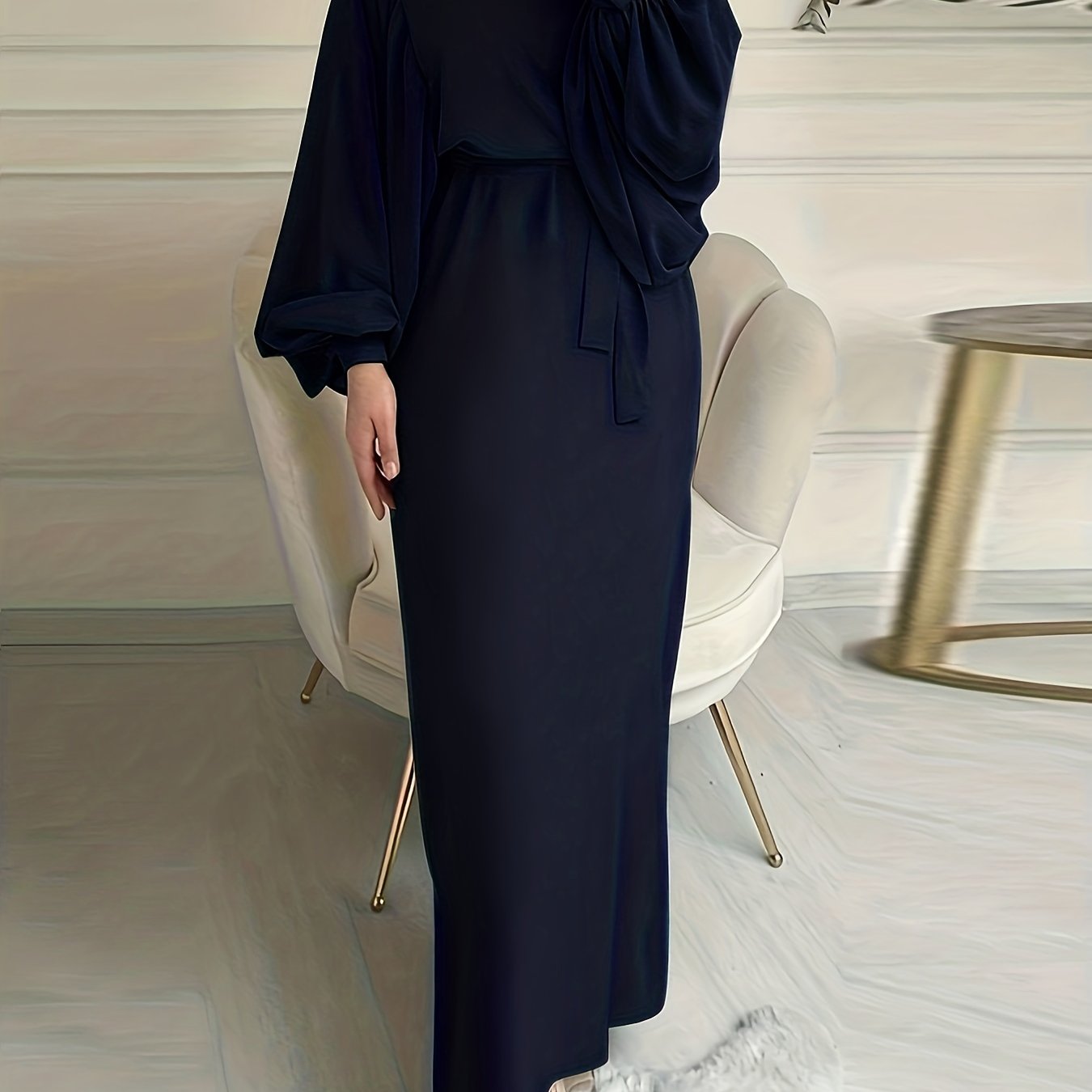 Elegant maxi abaya dress with solid tie waist and lantern sleeves.