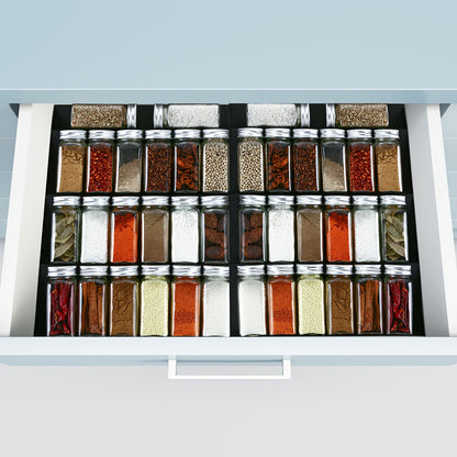 The TheaPro Adjustable Plastic Spice Drawer Organizer comes in a convenient 2-pack, with an expandable 4-tier design that fits neatly in kitchen cabinet drawers or countertops. This seasoning rack tray insert requires no assembly, making it easy to start