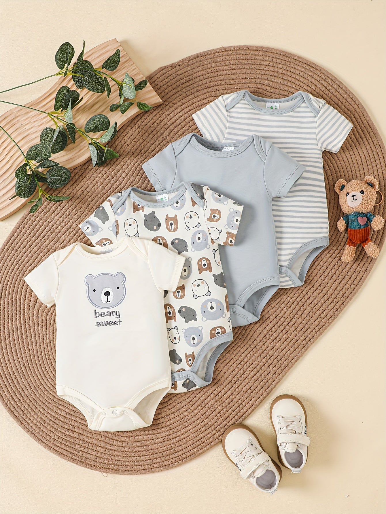 New four-piece set of triangle onesies for men and women, featuring bear cartoon pattern and creative solid color polka dot design. Made of pure cotton for comfort and softness, perfect for