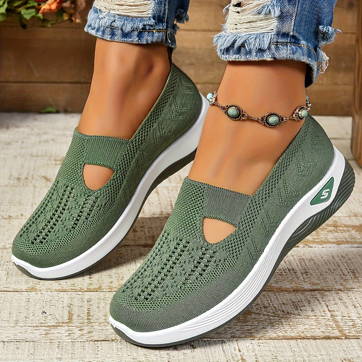 Women's slip-on sneakers in various colors with breathable fabric, EVA sole, and low-top design for all-season comfort.