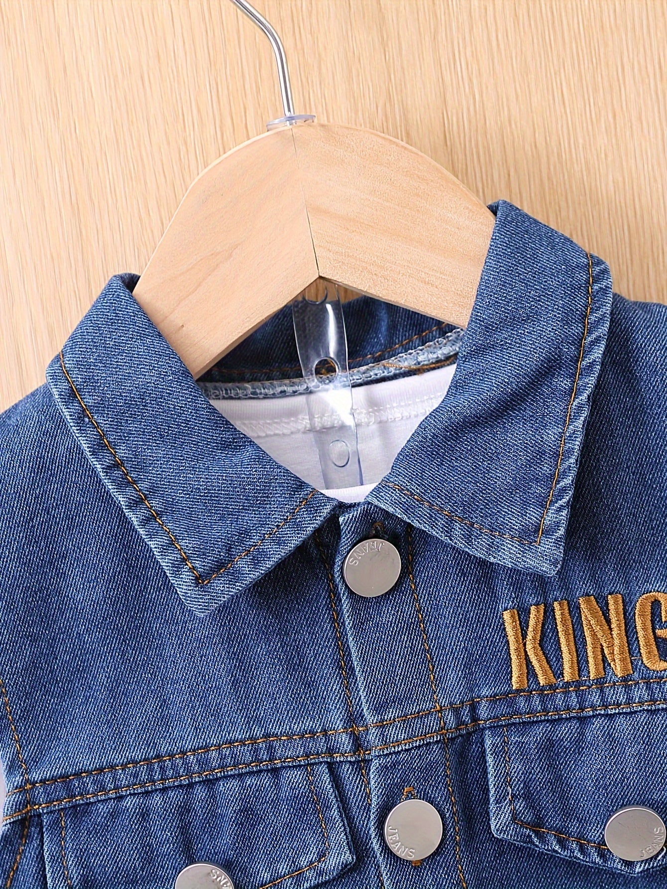 Boys' casual denim outfit with letter embroidery vest, short sleeve t-shirt, and pants.