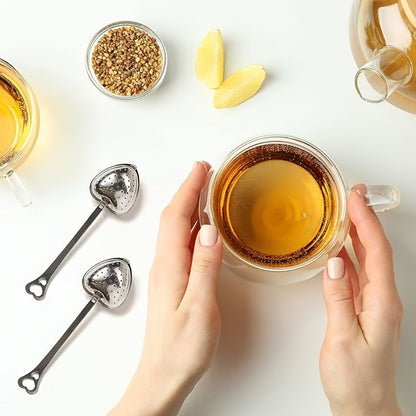 Heart-Shaped Tea Infuser made of Stainless Steel, featuring a Long Handle and Fine Mesh Strainer. Ideal for gifting during Christmas, Halloween, Thanksgiving, Valentine's Day, and Graduations.