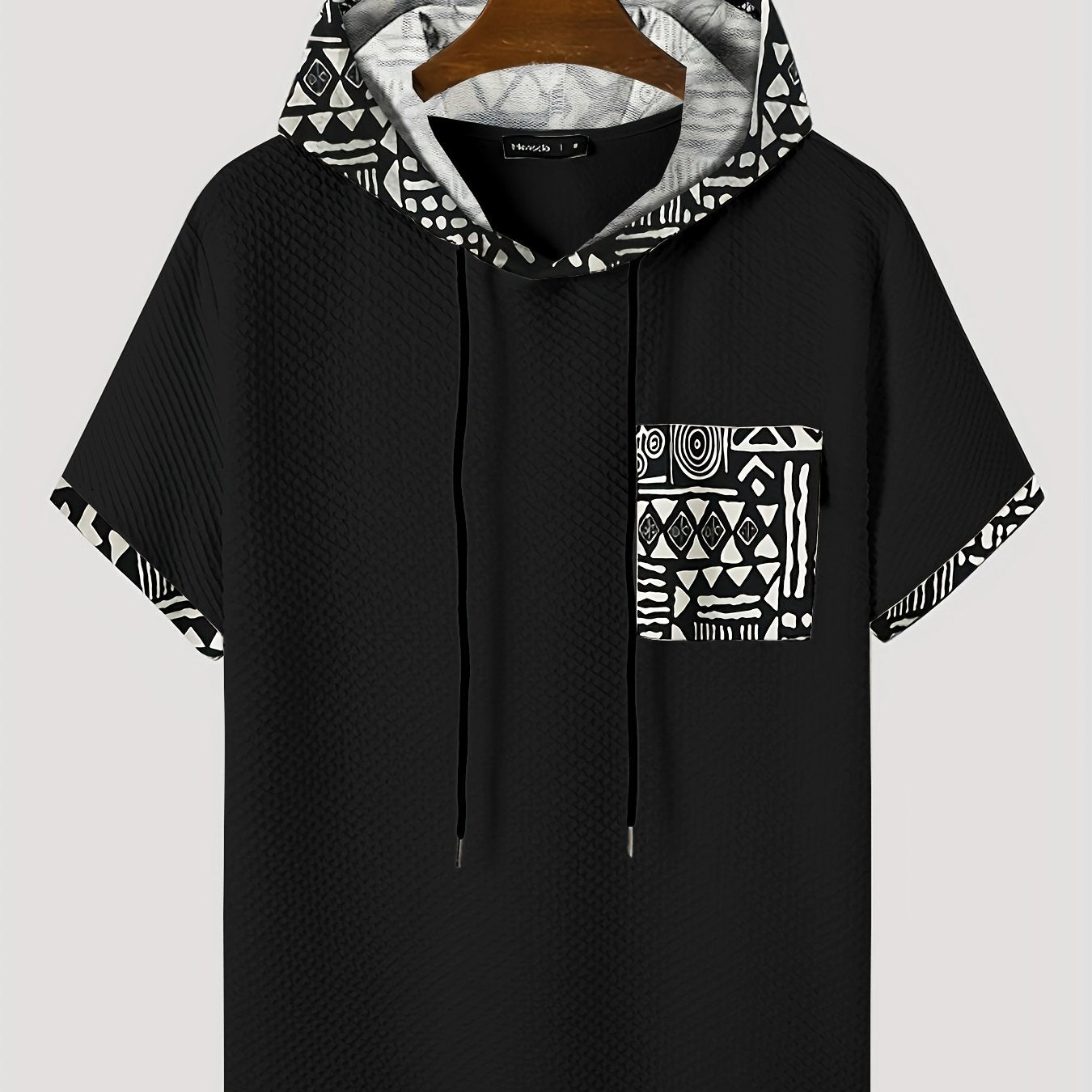 Men's plus size casual hooded t-shirt with geometric print, made from lightweight polyester fabric in gray with black and white patterns. Includes drawstring hood for comfortable fit and