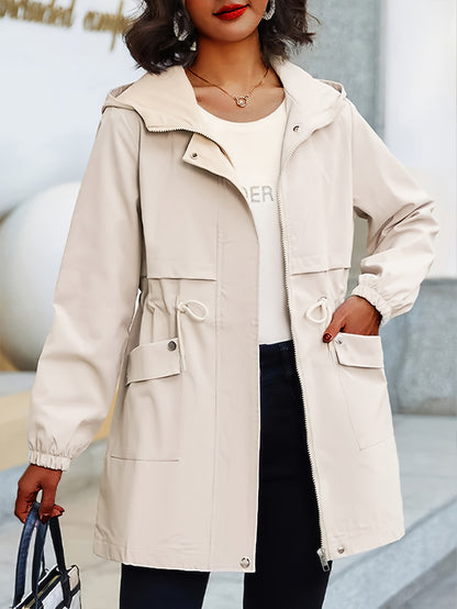 Plus size beige trench coat with hood in casual polyester, knee-length with long sleeves. Features zip-up closure, adjustable drawstring waist, and pockets.