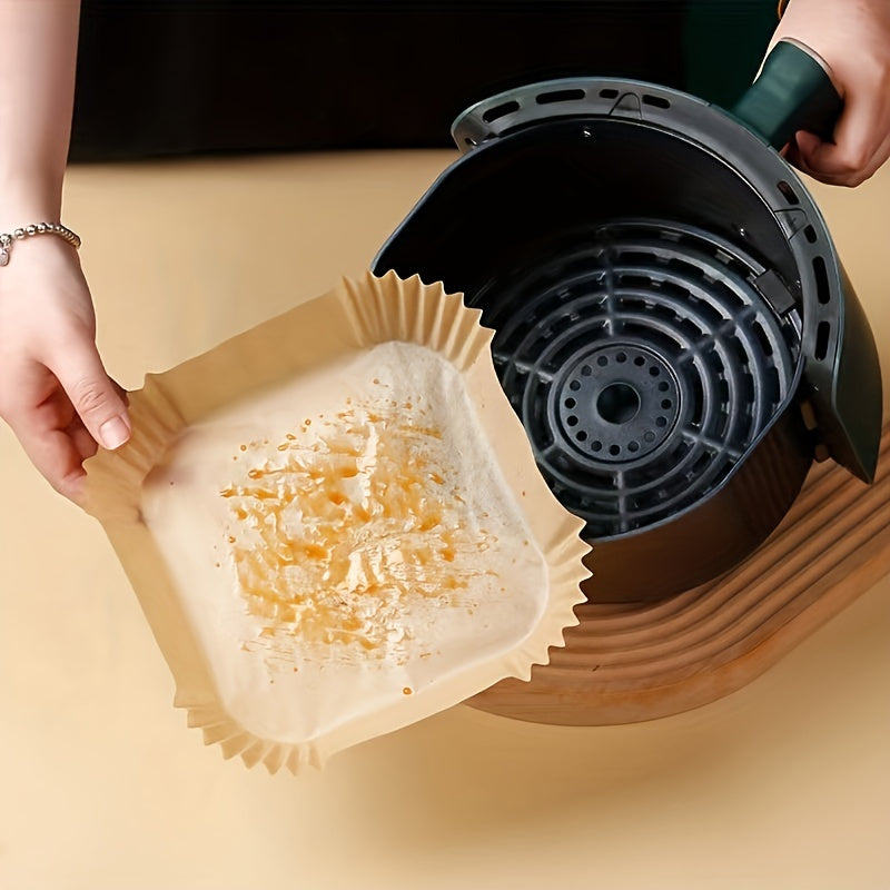 Disposable Air Fryer Liners available in packs of 30, 50, or 100 pieces. These liners come in two sizes, 16.0cm and 20.07cm, and can be used as Paper Air Fryer Liner Pots, Paper Basket Bowls, Baking Trays, and Oven Accessories. They are essential Baking