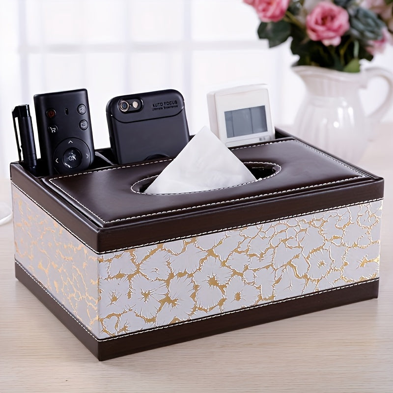 Versatile faux leather tissue and storage box with four compartments, ideal for coffee table and living room. Includes remote control holder and napkin organizer, perfect for home