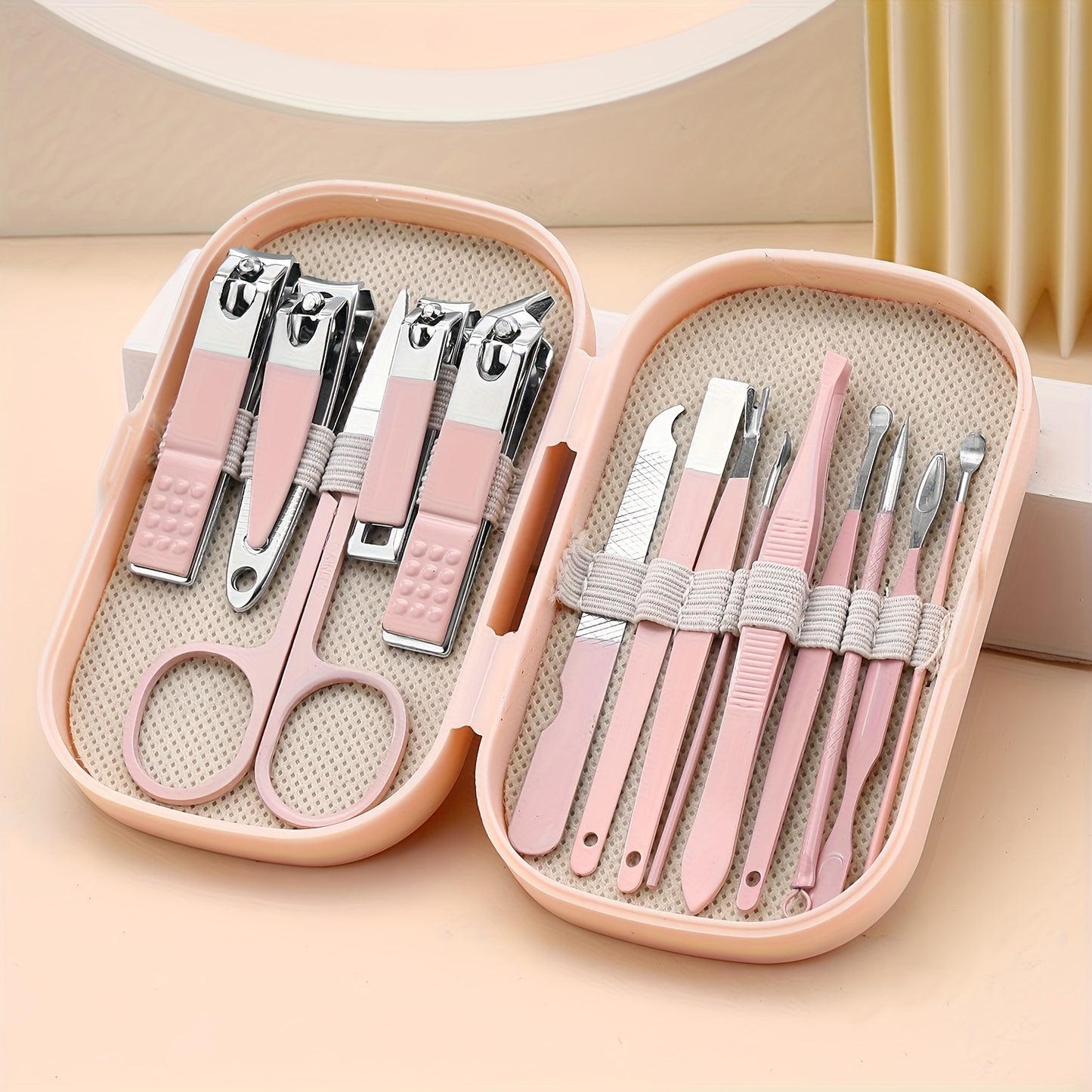 Portable nail art tool set for home use including nail clippers, ear spoon, acne needle, and nail beauty tools.