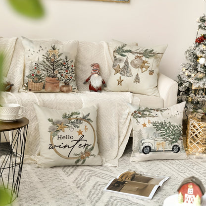 Four rustic linen pillow covers with winter and Christmas designs for home decor.