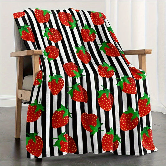 Black striped 1-piece Strawberry Printed Fleece Throw Blanket made from soft microfiber material with a durable twill weave. This all-season blanket features a digital print, is lightweight, and weighs between 250-300g. Perfect for adding a touch of