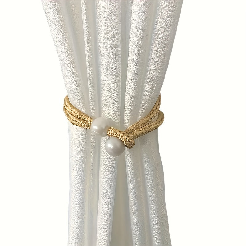 Fashionable and simple curtain binding rope available in 1 piece or 2 pieces. This decorative rope features creative pearl accents, adding beauty to your curtains. Use it as a decorative curtain buckle or binding strap for a simple and elegant touch.