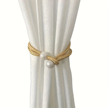 Fashionable and simple curtain binding rope available in 1 piece or 2 pieces. This decorative rope features creative pearl accents, adding beauty to your curtains. Use it as a decorative curtain buckle or binding strap for a simple and elegant touch.