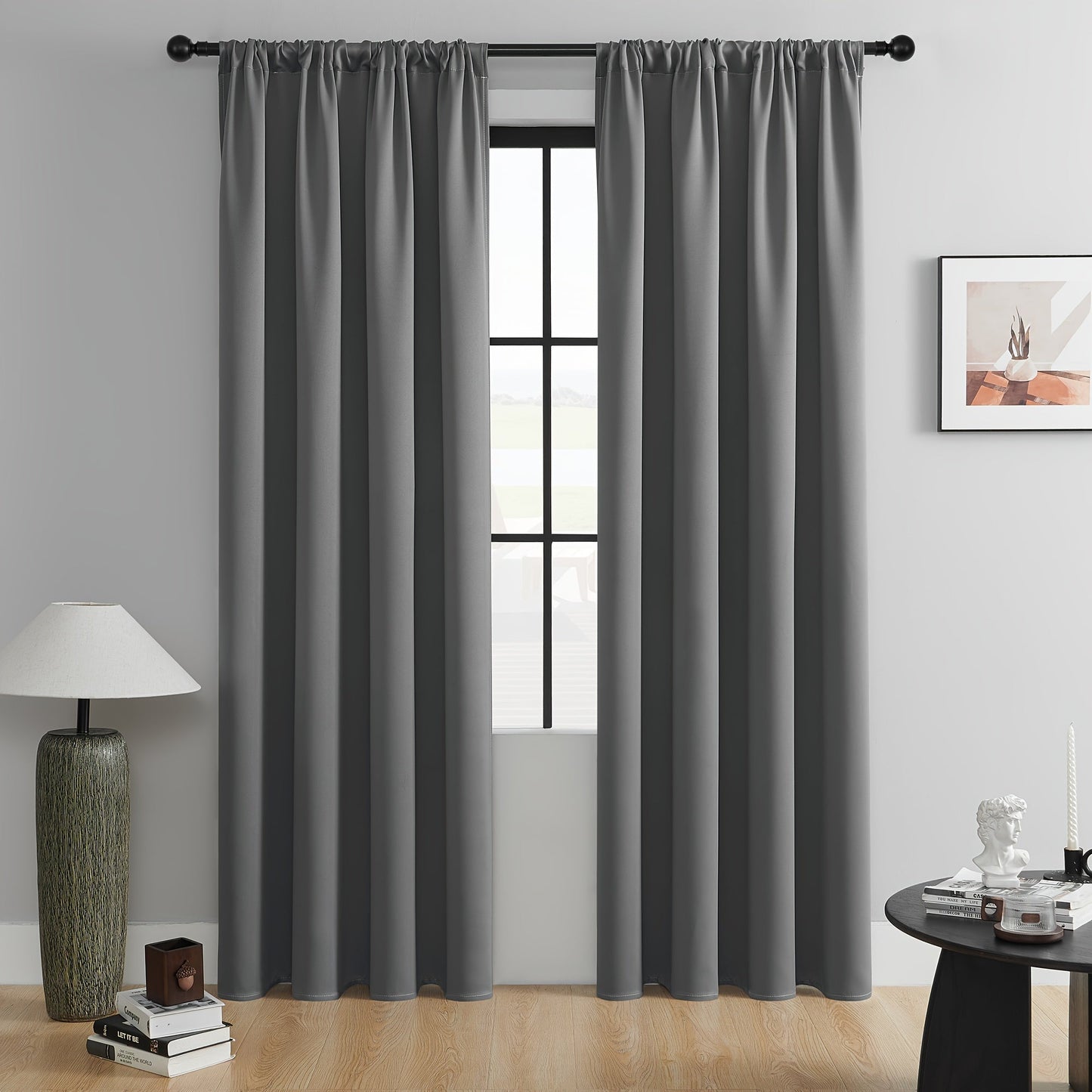 Add a touch of elegance to your living space with these 2 Panels Blackout Curtains. Perfect for both indoor and outdoor use, these curtains provide heat insulation and blackout capabilities. Made from a durable polyester blend, these simple and modern