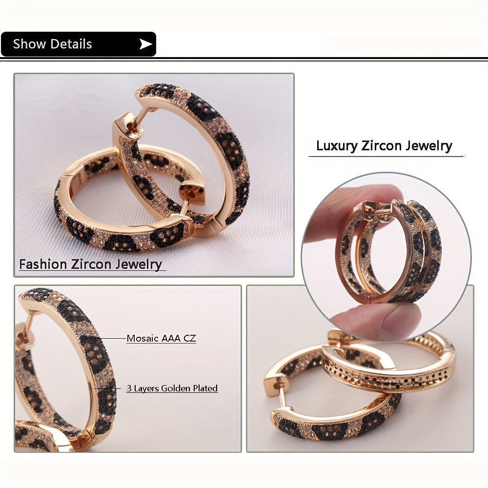 A set of stylish retro leopard print earrings with three rows of zirconia stones, crafted in copper for a bold and trendy look. These earrings are perfect for adding a touch of luxury to any outfit, and make a great gift for birthdays or just to treat