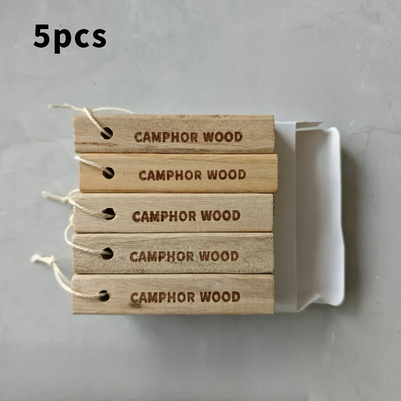 High-quality camphorwood strips, naturally sourced for use in wardrobes to prevent mildew, sterilize, remove odors, prevent moths, and enhance fragrance in the home.