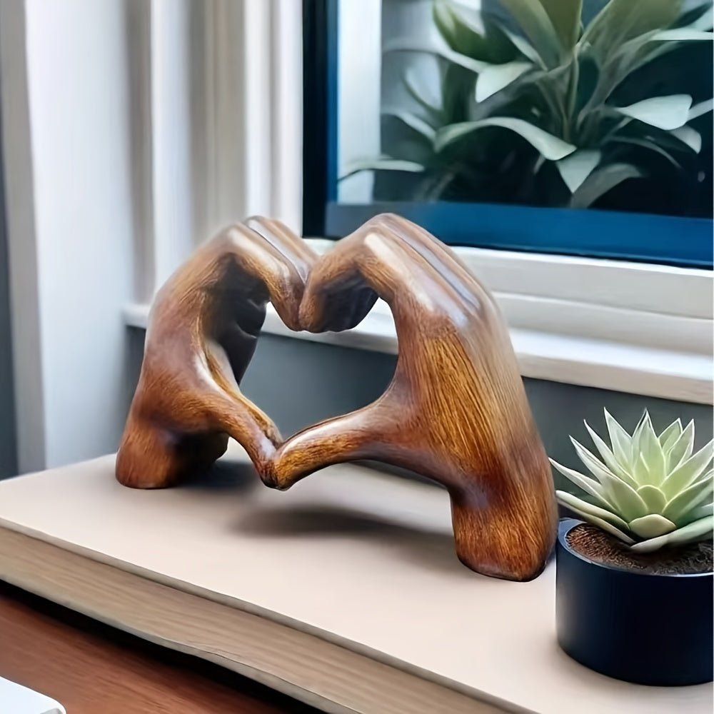 Heart-shaped resin sculpture for home or office decor. Perfect gift for holidays or special occasions.