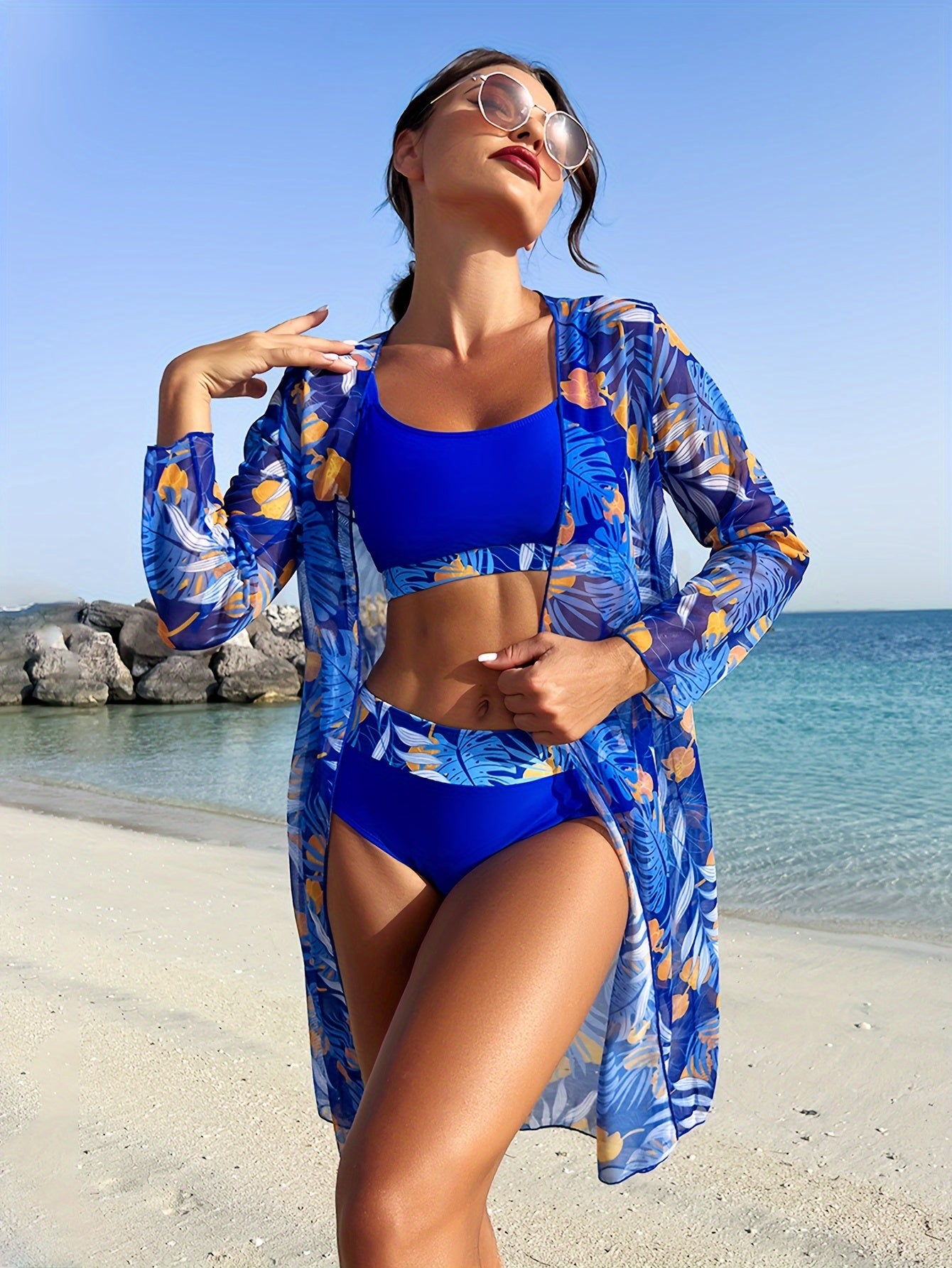 Tropical plant print cover-up set with sun protection for women.