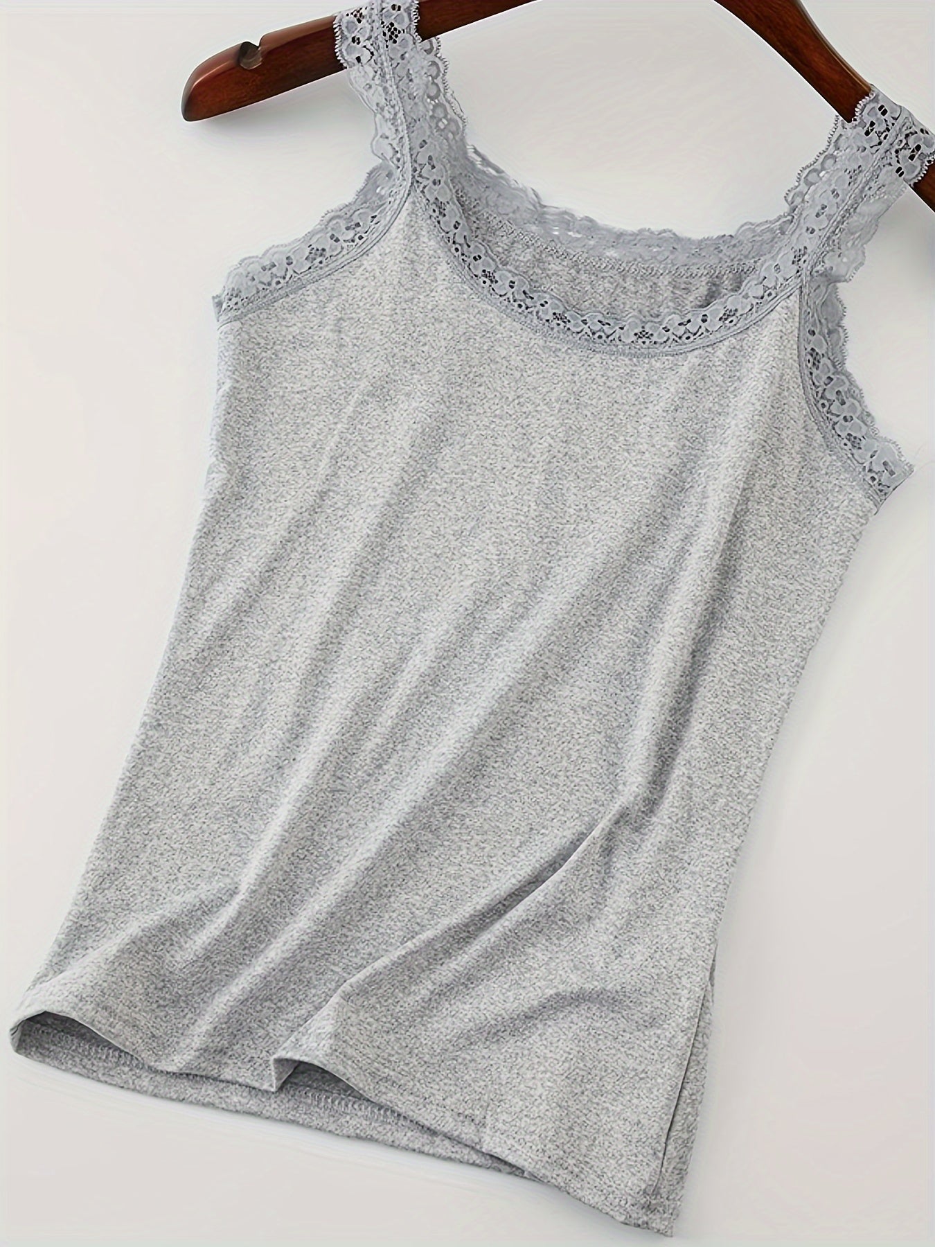 Three solid color lace trim tank tops in black, white, and gray. Versatile round neck design for all seasons. Basic fit and breathable for women's underwear.