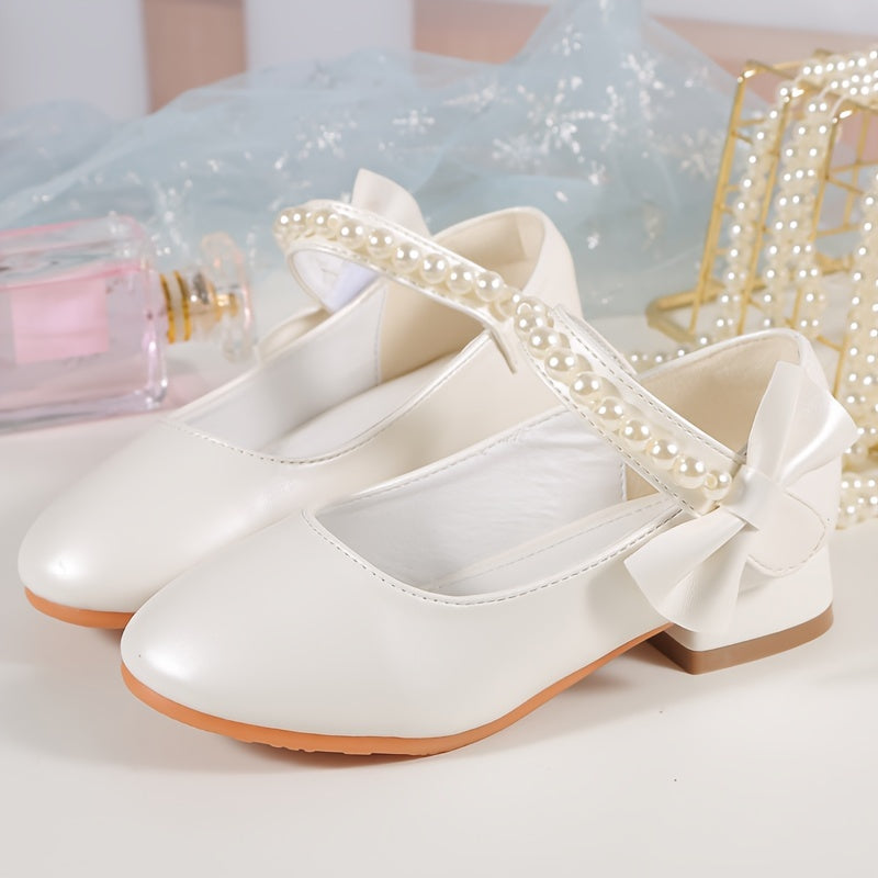 Princess high heels for girls with pearl accents and bowknot. Breathable and non-slip, perfect for school, parties, and formal events. White synthetic material with chunky heel and round