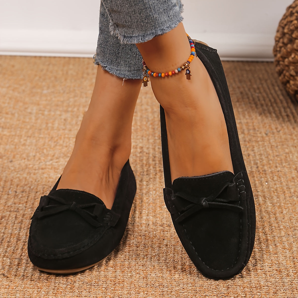 Retro flat loafers with bow detail, slip on style, and soft sole for casual wear.