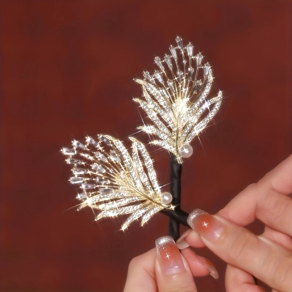 Feathered twist hair clip adorned with rhinestones