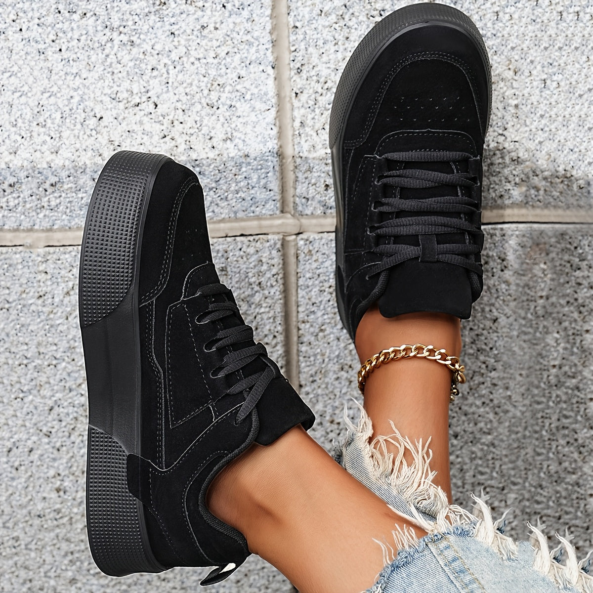 Classic lace-up low top skateboard sneakers for women, with solid color block design and height increase feature. Made with PU upper, fabric inner, and EVA sole for comfort in all seasons.