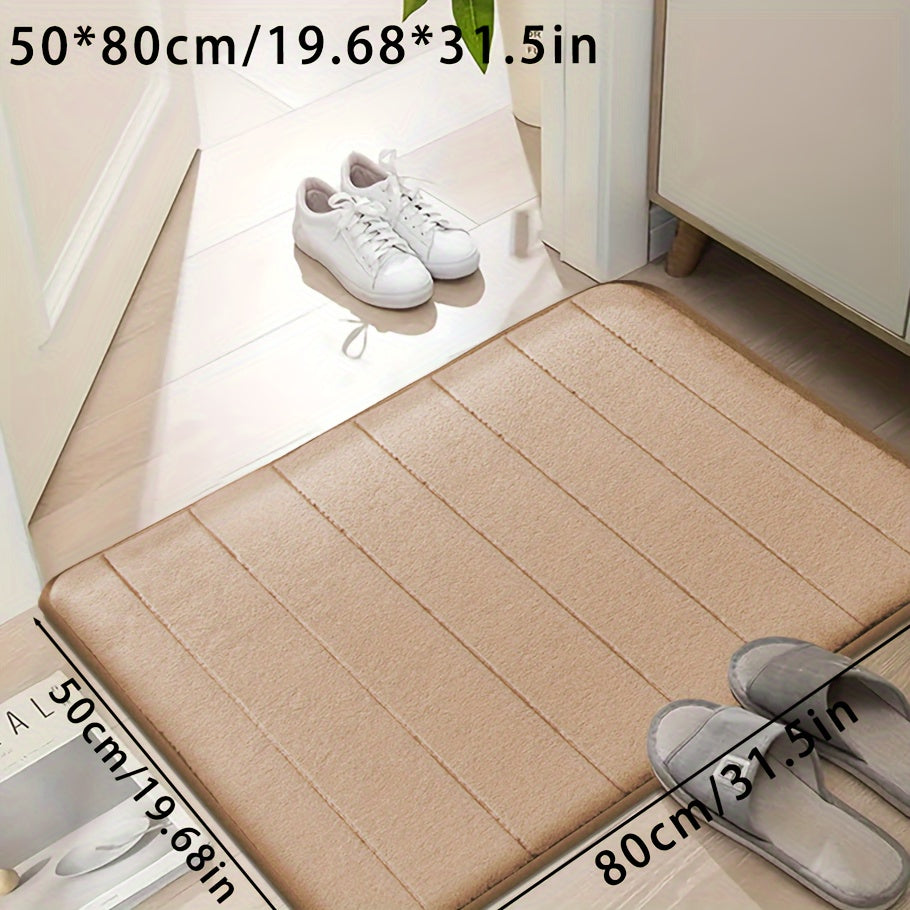 Set of memory foam bath mats, featuring ultra-soft and absorbent material with a non-slip backing. Ideal for use in the bathroom, shower, laundry room, or outdoor entrance. Made of durable polyester that is easy to clean in the washing machine. Can also