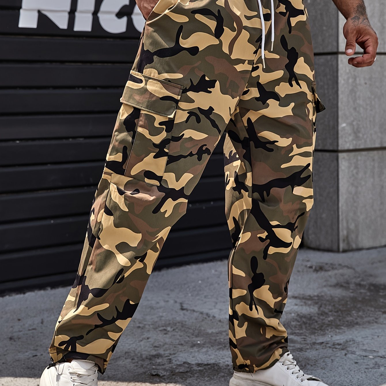 Men's plus size camo cargo pants, made of durable polyester with drawstring waist and multi-pocket design for outdoor activities.