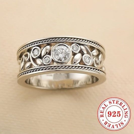 Beautiful silver ring for women, featuring a hollow leaf design with synthetic cubic zirconia stones. Made of 925 sterling silver, this elegant piece is perfect for daily wear and vacations. Ideal for those with an April birthday or anyone who loves