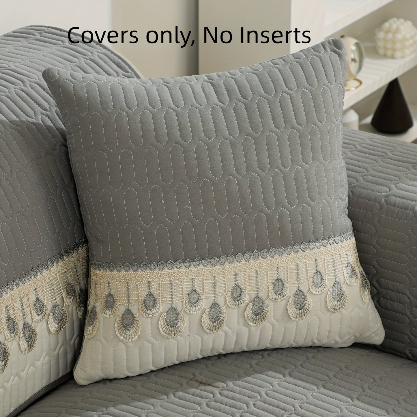 Luxurious Feather Embroidery Quilted Sofa Cover enhances and protects your couch.