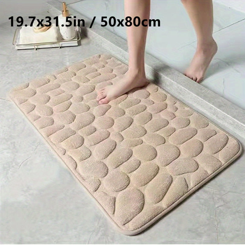 Cobblestone Embossed Bathroom Bath Mat - The Perfect Addition to Your Shower Room! This machine washable bath rug is designed for rapid water absorption, with a non-slip backing for added safety. Keep your bathroom floors dry and comfortable with this