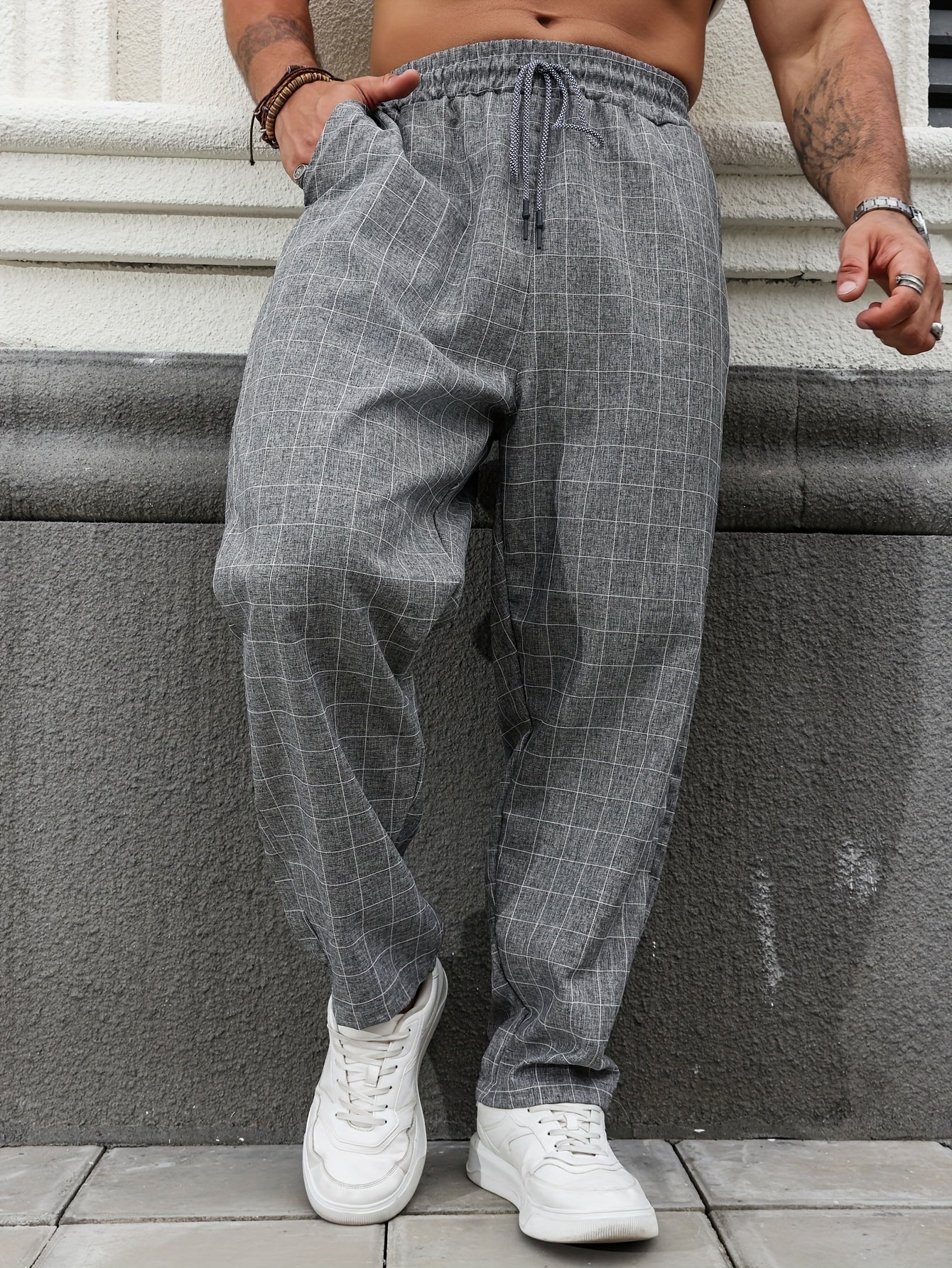 Oversized plaid pants for plus size men in breathable polyester for all seasons.