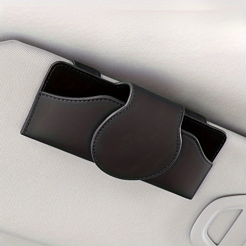 Car visor glasses holder with magnetic closure, PU leather eyeglasses storage clip, vehicle sun visor organizer with strong adsorption.